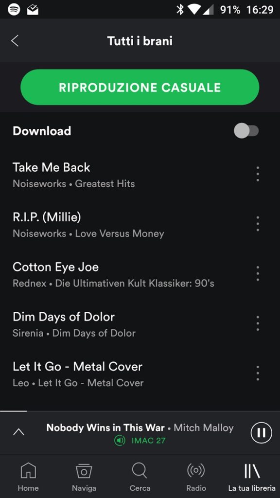 schermata di riproduzione della libreria musica e su spotify