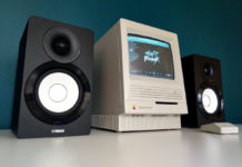 Un vecchio Mac SE/30 usato come lettore per Spotify Mac SE con Spotify