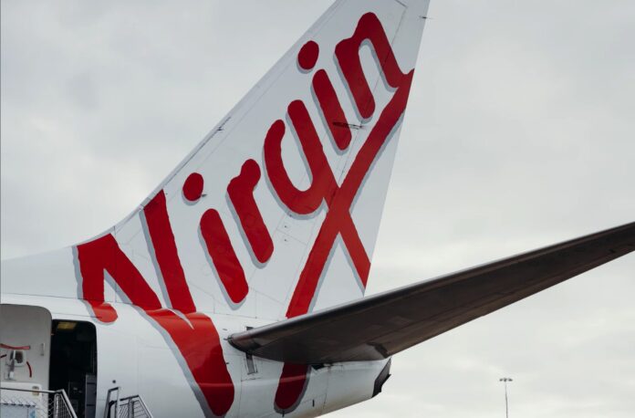 Virgin Australia vieta l’imbarco di tutti i MacBook