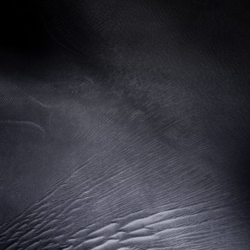 Esalta la Modalità Scura iOS 13 con questi sfondi per iPhone