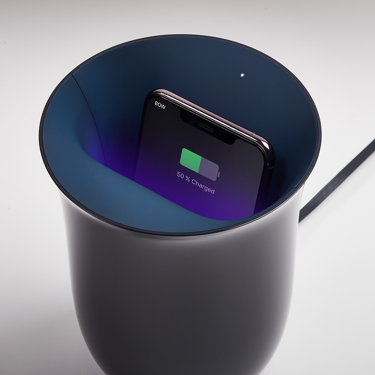 Lexon Oblio review, a wireless charging station with a beautiful reverence that's also in the living room