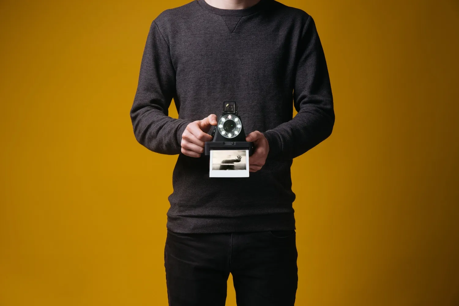 12-Holding-Camera-Front-YELLOW-3000px_1500