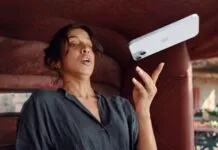 Cambiare funzione del tasto Azione di iPhone 15 in base all'orientamento